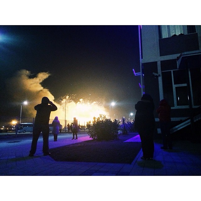 Fellow bar mates snap pics as Fisht Stadium illuminates the sky #Sochi2014 #SochiTODAY